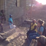 Joni sharing the Gospel with two ladies and their children.